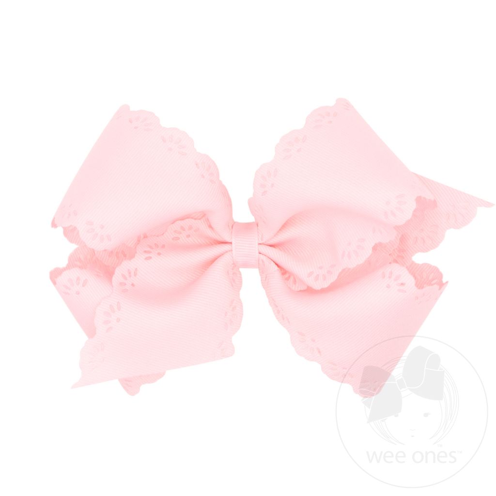 Small King Bow with Eyelet Embossed Edges in Powder Pink - Doodlebug's Children's Boutique