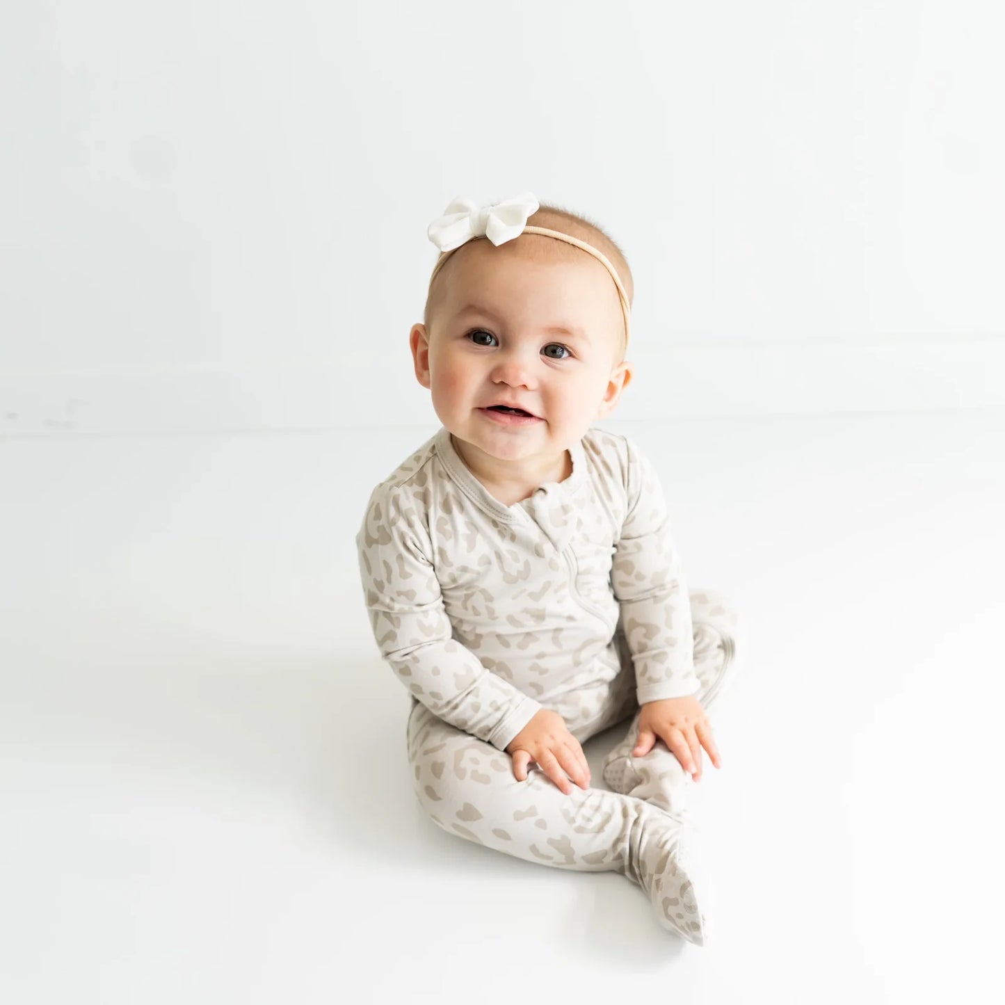 Zippered Footie in Oat Leopard - Doodlebug's Children's Boutique