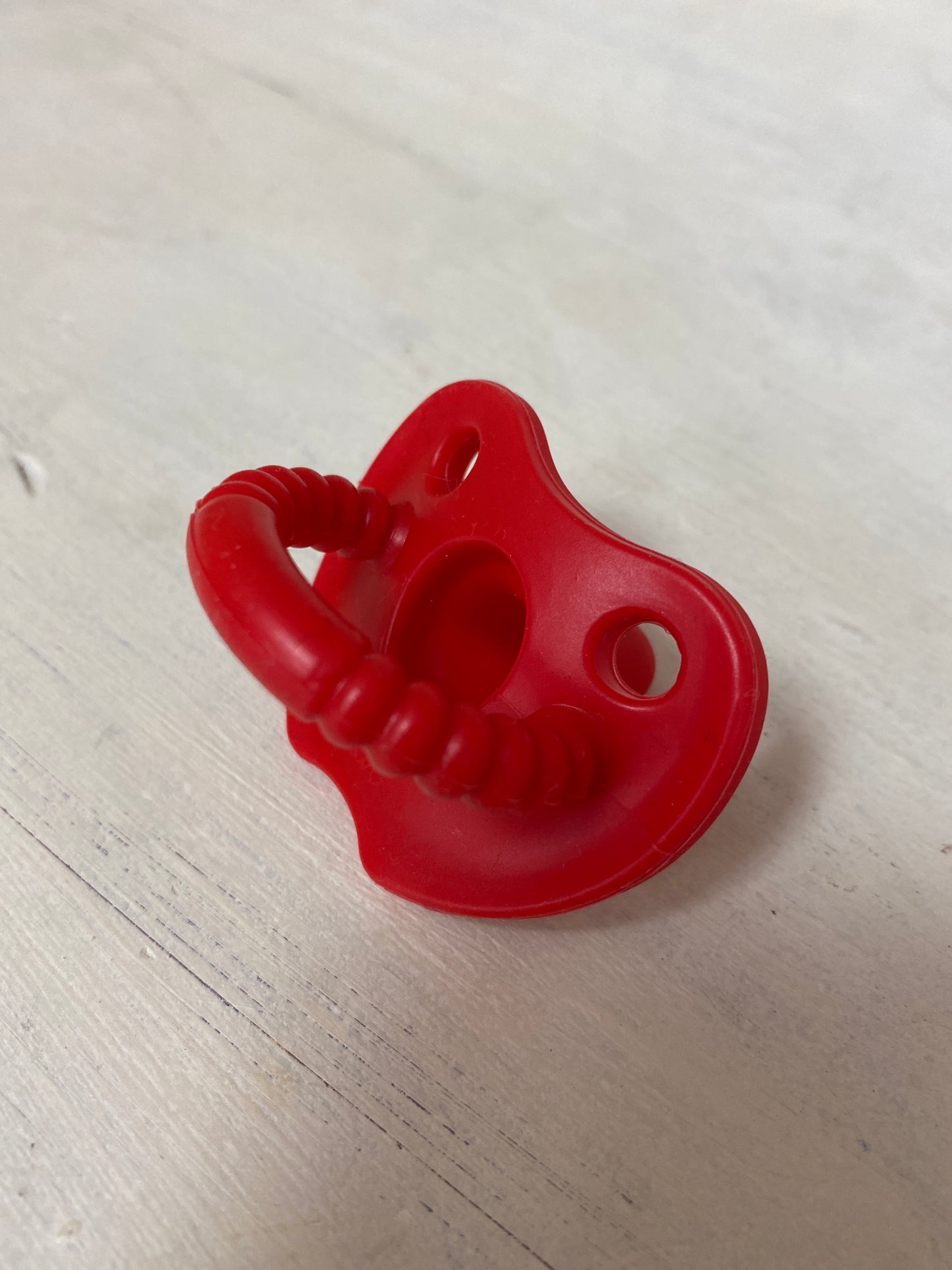 Flat Sili Soother in Scarlet Red - Doodlebug's Children's Boutique