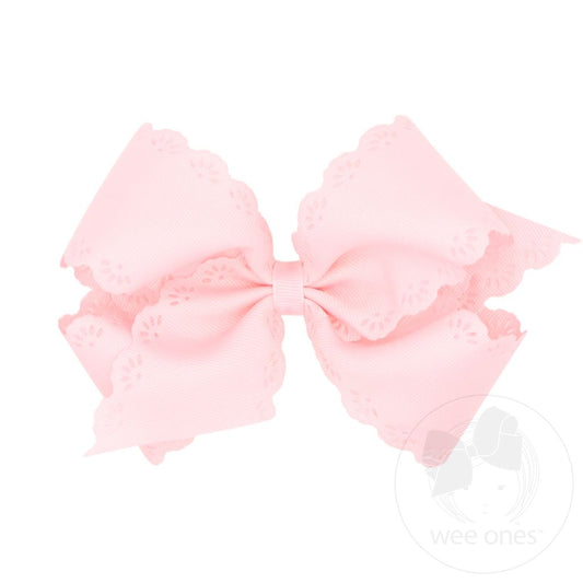 Small King Bow with Eyelet Embossed Edges in Powder Pink - Doodlebug's Children's Boutique