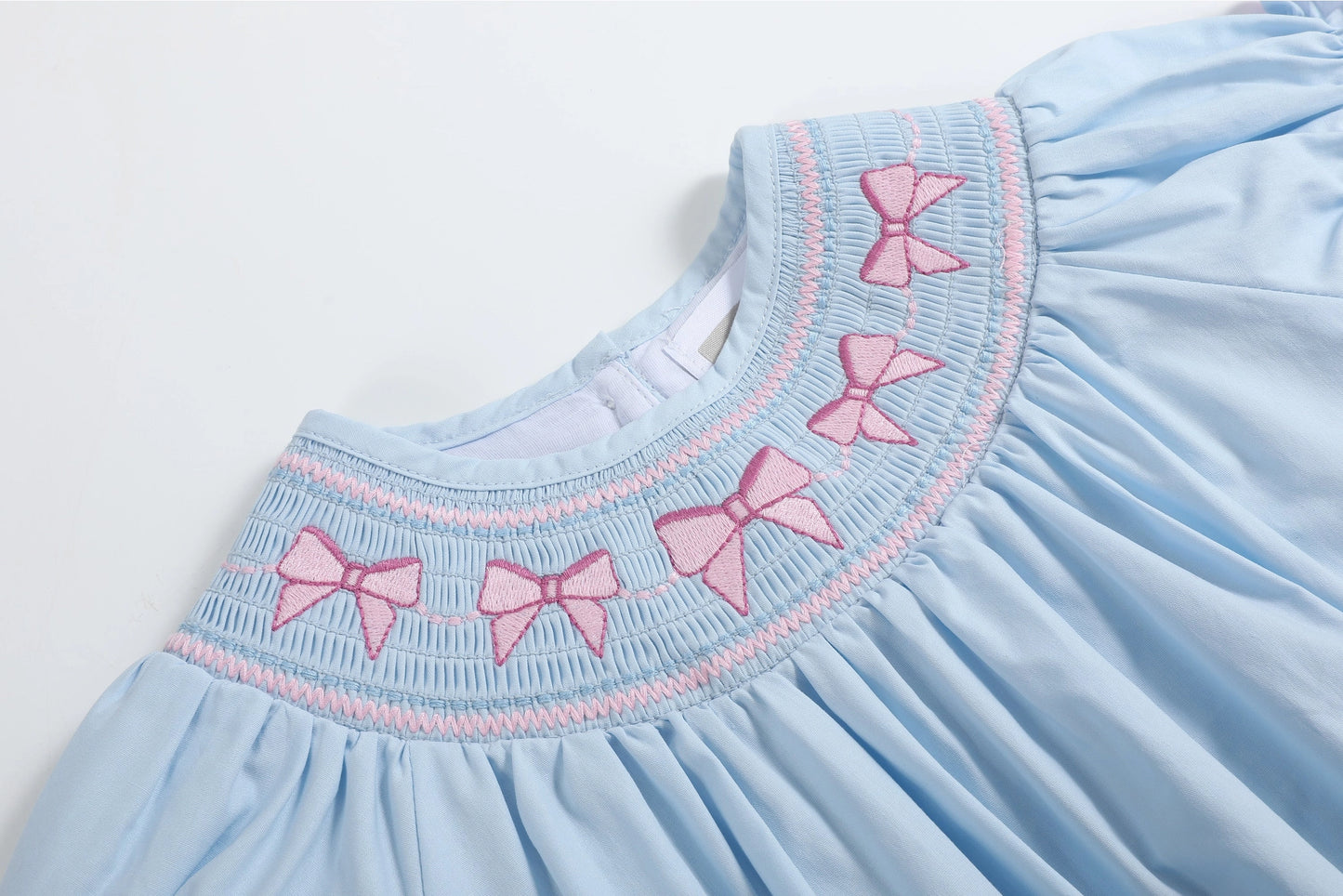Blue and Pink Bows Smocked Romper - Doodlebug's Children's Boutique