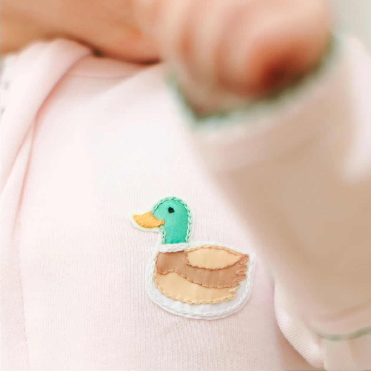 Mini Mallard Embroidered Ruffle Zip Footie in Pink - Doodlebug's Children's Boutique