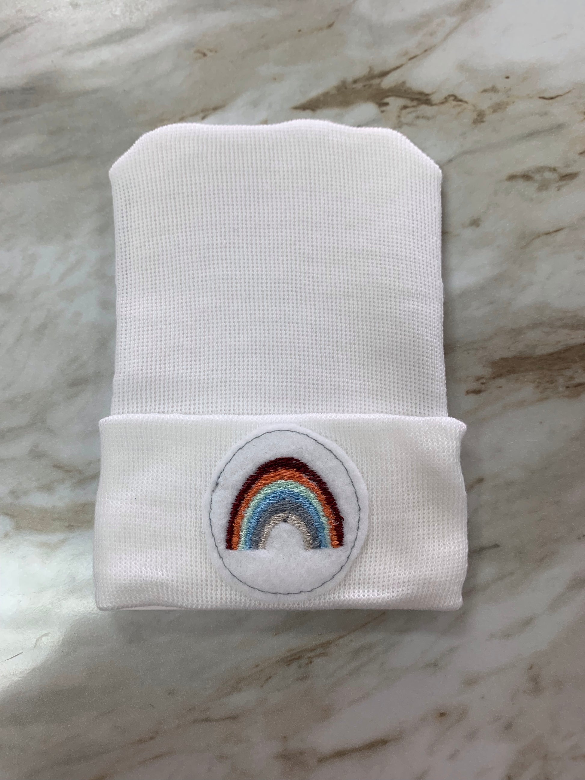 White Rainbow Cutie Newborn Hat White Rainbow - Doodlebug's Children's Boutique