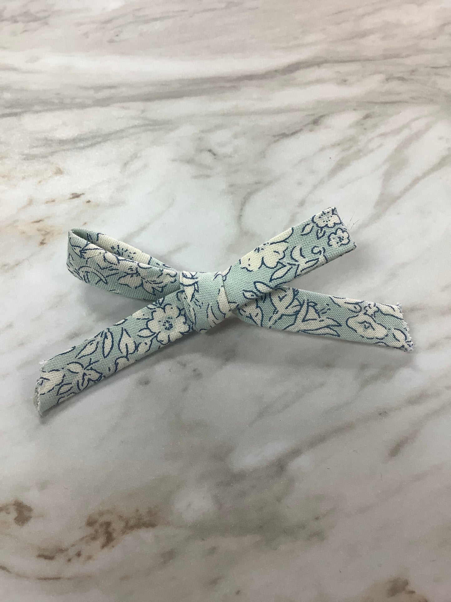 Hand Tied Bow on Clip in Blue Floral  - Doodlebug's Children's Boutique